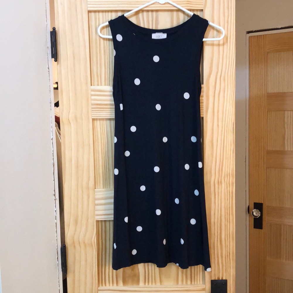 Classy navy and white polka-dotted dress. Barely worn, no signs of wear.